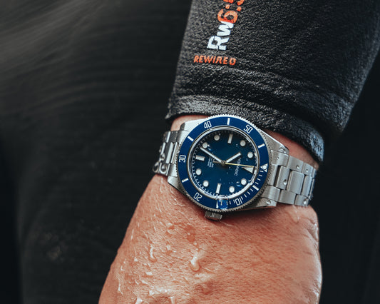 Board shorts or Boardroom? How to Wear a Dive Watch with Casual and Formal Styles